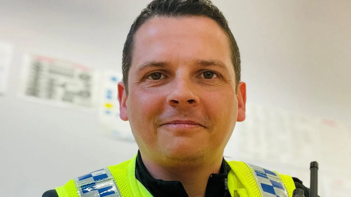 A photograph of Lee Broadbent in police uniform
